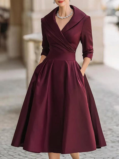 Birute Wrap V-Neck Midi Dress with Three-Quarter Sleeves